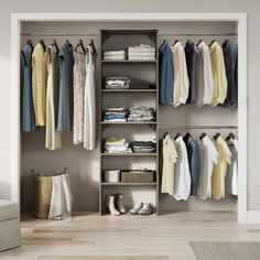 an open closet with clothes and shoes hanging on the rails, next to a couch