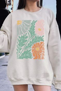 Distressed Boho flower Graphic Fleece Sweatshirts.Unisex Crew Neck Long Sleeve Sweaters Knits.Crafted from premium materials, tailored to your lifestyle, ensuring a comfortable fit for any occasion.Family Group Uniforms Birthday Party Gift Concert Festival Events.High Quality Direct To Film Printed Graphic Design.50%COTTON,50%POLYESTERNICARAGUAMade In: Nicaragua Cozy Graphic Print Sweatshirt For Spring, Green Graphic Print Sweater For Spring, Oversized Floral Print Sweatshirt For Fall, Cream Graphic Print Sweatshirt For Spring, Spring Cream Graphic Print Sweatshirt, Spring Cream Graphic Sweatshirt, Flower Shaped Relaxed Fit Sweatshirt For Fall, Relaxed Fit Flower Sweatshirt For Fall, Long Sleeve Sweaters