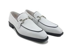 Burnished Calfskin Slip-On Loafer White Elegant Burnished Calfskin slip-on Loafer from the Carrucci collection features a Double Gore for your perfect fit, soft Calfskin lining, Horsebit Hardware detailing, and a clean welt! White Almond Toe Slip-ons For Business, Slip-on Dress Shoes For Spring Galas, Classic White Almond Toe Slip-ons, Elegant Slip-ons For Spring Galas, Elegant White Slip-ons For Office, White Leather Slip-ons For Office, Plain Toe Dress Shoes For Spring Galas, Spring Gala Plain Toe Dress Shoes, Spring Gala Slip-on Dress Shoes