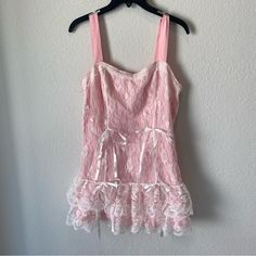 Romwe Pink Lace Mini Dress Nwt Per Size Tag Is A Size L However States Us Size 8/10 Which Is A M Style Tags: Balletcore, Halloween, Festival, Concert, Angel Thrift Manifestation, Romwe Dress, Festival Concert, Halloween Festival, Lace Mini Dress, Pink Lace, Size Tag, Sleep, Angel