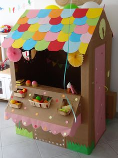 a child's play house made out of cardboard