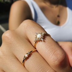 "An opal-centered flower adds dainty delight to this fine-featured ring you'll wear everywhere. ♥ Crafted in gold plated on the top of 925 sterling silver ♥ Nickel free ♥ All items are packed inside an elegant Gold Spoon jewelry box. If you are purchasing a product to send as a gift, we can send the product directly to the recipient. Please ensure you write the recipient's address as the shipping address (not your own) at checkout. Free Shipping On All Domestic Orders $35+ (USA ONLY) Free Shippi Gold Opal Open Ring Dainty Style, Dainty Yellow Gold Stackable Opal Ring, Dainty Stackable Opal Ring Gift, Minimalist 14k Gold Stackable Opal Ring, Dainty Gold Opal Open Ring, Dainty Delight, Gold Spoon, Opal Band, Dainty Gold Rings