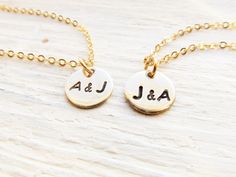 "※Charm Diameter: 10mm (3/8\") tall ※Necklace lengths: 18\" (hers) and 20\" (his); can be made different lengths by request in the personalization box These personalized necklaces features a solid brass disc that will be hand stamped with two initials of your choice separated by an & sign. The charm is attached to a fine gold-plated chain with a lobster clasp closure. By default, the stampings will be blackened and in uppercase. Please leave a note in the personalization box if you would pre Necklaces Initials, Initials Jewelry, Boyfriend Girlfriend Jewelry, Couples Necklace, Jewelry For Him, 20th Birthday Gift, Girlfriend Jewelry, Gift For Valentines Day, Initial Necklaces