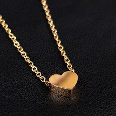 Product Details Hypoallergenic jewelry for sensitive skin Stainless Steel Rose Gold Tone PVD Chain Dainty Heart Pendant Necklace Indulge in timeless elegance with our Women's Stainless Steel Dainty Heart Pendant Necklace featuring a captivating Solitaire Heart Pendant. This exquisite necklace is designed to capture attention and adorn you with understated sophistication. This stainless steel chain necklace is built to withstand the test of time. The durable construction ensures that you can enjo