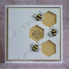 a card with three bees on it