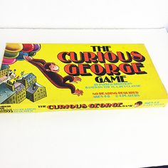 the curious george game is in its original box