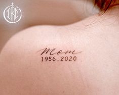 the back of a woman's shoulder with a tattoo that reads mom 1956 - 2020