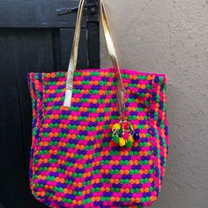 Boho Tote Bag- Brand New, Never Used. With Pom Pom Beaded Charm. Hot Pink/Orange/Purple/Green With Crinkled Gold Leather Straps. 15”Wide 15” Deep, 6” Deep Gusset, 9” Strap Drop To Top Of Bag. Lined With Hot Pink Raw Poly Silk, With Interior Zippered Pocket And Cell Phone/Key Pocket. Very Cool Summer Tote! Multicolor Beaded Pouch Bag, Multicolor Tote Shoulder Bag For Party, Beaded Multicolor Bags For Shopping, Pink Beaded Bag For Everyday Use, Pink Beaded Bags For Daily Use, Everyday Pink Beaded Bag, Pink Beaded Tote Bag, Pink Shoulder Bag For Festival, Pink Pouch Shoulder Bag For Festival