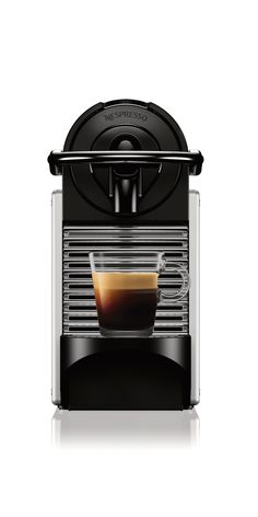 an espresso machine with coffee in it