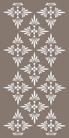 an ornate pattern in white on a brown background