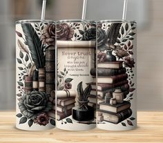 two cans with books and flowers on them