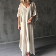 PRE-WASHED SOFT* Meet our Mykonos v neck Kimono, it's super soft , made from finest 100% Turkish cotton. The Mykonos v neck kimono is perfect for resort wear , Beach wear , thoughtful Gift, or use as a lightweight Dress at the home.100% Turkish Aegean natural cotton. Oeko-Tex certified, it's free from harmful chemicals Size: One size most fit. Machine wash. Tumble dry low. Colors do not bleed or fade with wash. Relaxed Fit V-neck Cover-up For Vacation, Casual Beige V-neck Cover-up, Oversized V-neck Spring Cover-up, Summer V-neck Relaxed Fit Kaftan, V-neck Kaftan For Vacation, Casual Oversized V-neck Cover-up, Casual V-neck Relaxed Fit Kaftan, Oversized V-neck Beachwear Cover-up, Summer V-neck Kaftan For Beach Season