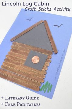 the lincoln log cabin craft sticks activity is made out of wood and has a penny