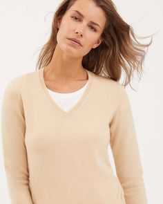 DESCRIPTIONThis V-neck women's sweater is crafted from plain knitted kid cashmere, an extremely fine and soft fibre, obtained exclusively from the undercoat of the Hircus goat kids. The sweater features a micro-ribbed neckline trim. Its precious and exclusive yarn makes this garment the luxury version of an essential knitwear item.FABRICSThe "kid cashmere" yarn is obtained from the undercoat of Hircus goats kids. The natural molt allows to harvest this precious, exclusive and ultralight fibre wi Goat Kidding, Cashmere Yarn, Ribbed Neckline, Women's Wardrobe, V Neck Sweater, Vneck Sweater, Women's Sweater, Knitwear, Cashmere