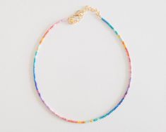 Dainty Rainbow Ombre Seed Bead Choker Necklace Rainbow Beaded Necklace Stackable Seed Bead Necklace Tiny Rainbow Ombre Necklace - Etsy Trendy Rainbow Necklaces With Tiny Beads, Adjustable Rainbow Beaded Necklaces For Summer, Rainbow Tiny Beads Necklace For Summer, Trendy Rainbow Jewelry With Tiny Beads, Summer Rainbow Beaded Necklaces With Tiny Beads, Adjustable Rainbow Beaded Choker Necklaces, Rainbow Tiny Beads For Summer, Adjustable Rainbow Single Strand Beads, Adjustable Single Strand Rainbow Beads