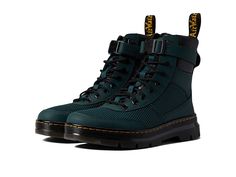 Dr. Martens Combs Tech - Shoes : Racer Green Opencell Spacer Mesh Hector : High step into the lightweight design and supportive feel of the Dr. Martens Combs Tech utilitarian combat boot. Ajax leather and Extra Tough Poly upper. Ajax leather is a PU-coated split leather with a subtle geometric emboss. Built with classic Dr. Martens DNA including grooved edges, an AirWair™ heel loop, and visible stitching. Traditional lace-up system with flecked fabric laces and tonal eyelets for a secure fit. Ad Outdoor Boots With Textured Sole For Fall, Fall Outdoor Boots With Textured Sole, Textured Sole Boots For Fall Streetwear, Leather Hiking Boots For Fall Streetwear, Leather Footbed Combat Boots For Outdoor Fall Activities, High-top Leather Combat Boots For Work, Fall Outdoor Combat Boots With Leather Footbed, Fall Leather Combat Boots For Outdoor, Outdoor Ankle Combat Boots With Leather Footbed