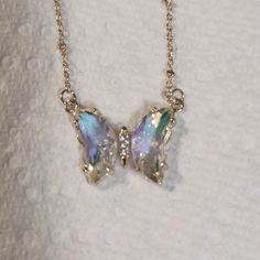 Lovestylize "Blaine" Necklace, Clear Iridescent Crystal Butterfly Charm. Gold Plated Brass Chain, 16.5 Inches Plus 3 Inch Extender. This Was A Gift So I'm Not Sure Why The Tag Is Stapled On. Maybe That's How The Maker Sends It But It Looks Odd, So I'm Not Labeling It Nwt. Smoke-Free Pet-Friendly Home. I Included As Many Different Photos As Possible To Show How The Charm Picks Up And Reflects Various Colors Around It. Rare Butterflies, Butterfly Things, Crystal Butterfly Necklace, Iridescent Necklace, Crystal Jewelry Necklaces, Different Photos, Body Accessories, Preppy Jewelry, Iridescent Crystal