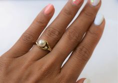 This is a Japanese Akoya pearl ring with a small diamond and is set in 14K yellow gold. The size of the pearl is approximately 7mm. It is silver white in color with high luster. This ring is a size 6.5 Once resized, it is NON-refundable and NON-exchangeable, it is considered FINAL SALE. So, make sure you know your correct ring size. Please read my shop policies for more details! We will ship out the goods once we have received payment. For more information, Like us on Facebook, follow us on Inst Anniversary Yellow Gold Pearl Ring With Diamond, Gold Pearl Ring With Single Diamond For Wedding, Gold Pearl Ring With Single Diamond For Promise, Gold Akoya Pearl Ring For Wedding, Anniversary Yellow Gold Pearl Ring With Charm, Classic Gold Pearl Ring With Diamond, Gold Pearl Ring With Single Diamond As Gift, Akoya Pearl Ring, Baby Pearls