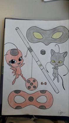 a drawing of two cats and a cat with a fishing rod in its mouth, on top of a sheet of paper