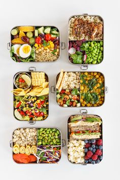 six lunch boxes filled with different types of food