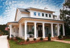 a large white house with columns on the front