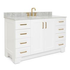 a white bathroom vanity with gold handles and drawers