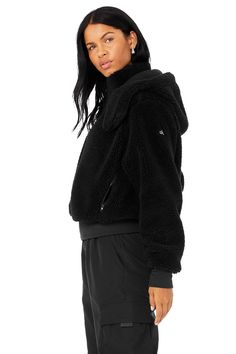 Easy come, easy go. Cut from cozy sherpa and equipped with a removable hood and zip pockets, our ultra-comfy Foxy Sherpa Jacket will get you to the studio every time. Features a front-zip closure, oversized silhouette and ribbed cuffs and hem. On-trend oversized fit Removable hood & zippered pockets Designed to work from studio to street Wear-tested by our in-house team for the perfect fit Foxy Sherpa Jacket in Black, Size: XS | Alo Yoga® Alo Yoga Winter Outerwear With Ribbed Cuffs, Alo Yoga Hooded Outerwear With Drawstring, Black Hooded Sherpa Fleece Jacket, Hooded Alo Yoga Outerwear With Ribbed Cuffs, Alo Yoga Hooded Outerwear With Ribbed Cuffs, Alo Yoga Hooded Outerwear For Winter, Alo Yoga Fall Outerwear With Drawstring Hood, Alo Yoga Drawstring Hood Outerwear For Fall, Alo Yoga Outerwear With Drawstring Hood For Fall