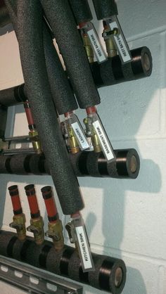 there are many different pipes attached to the wall