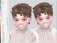 an image of two children with pacifiers in their mouths and nose rings on