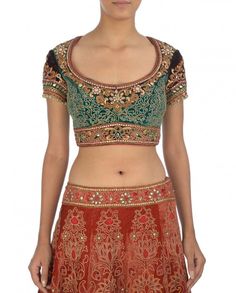 This traditional bridal lehenga in shaded silk velvet with gota, dori and zardozi embroidery, accentuated with mirror work border and crystals. Comes with an embroidered short blouse and shaded and embroidered border dupatta. Made to order piece and will be delivered after 45 days of purchase. Traditional Kundan Choli With Mirror Work, Semi-stitched Kundan Choli With Dori Work, Fitted Velvet Lehenga With Resham Embroidery, Dola Silk Choli With Mirror Work, Velvet Lehenga With Mirror Work And Traditional Drape, Velvet Sharara With Mirror Work And Traditional Drape, Designer Velvet Anarkali Set With Intricate Embroidery, Velvet Sharara With Mirror Work, Designer Velvet Sharara With Mirror Work