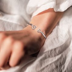 If you're looking for a beautiful and sentimental way to show your best friend some love, this bracelet is a perfect choice. The sleek, minimalist design is perfect for everyday wear, and the two delicate hearts represent you and your best friend, reminding you of all the good times you shared together. Whether you wear it as a daily reminder of your special bond or give it to your best friend as a gift, this bracelet is sure to be cherished for years to come. Why buy from us?: Crafted in Solid