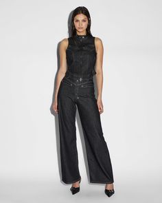 The Strider Biker Midnight is a moto-inspired, wide fit jean with a super high rise waist. This wide leg jean creates a flattering silhouette and can be styled with heels or stacked over sneakers. Made from a comfort-stretch denim in a textured black colourway with a light grey topstitch. Detailed with an exposed metal zip fly, angled pockets, branded embroidery and a Ksubi pocket tag. Style back with the Paradigm Crop Jacket Midnight for a moto-inspired set. Midnight Black, Crop Jacket, Black Denim, Jeans Fit, Stretch Denim, Zip Pockets, Light Grey, Wide Leg, High Rise