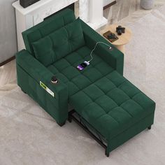 a green couch and ottoman in a living room