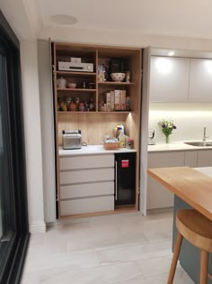 a kitchen with an oven, sink and cabinets