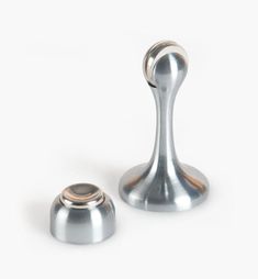 two metal knobs on top of each other