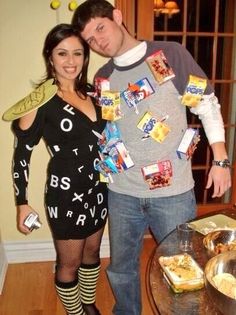 a man and woman are dressed up as candy bar characters, posing for the camera