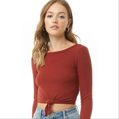 * Brand Name: Forever 21 * Size: M * Color: Rust * Retail Price: $15 * Details: A Brushed Ribbed Knit Crop Top Featuring A Round Neck, Long Sleeves, And A Knotted Hem *Content: 67% Polyester, 29% Rayon, 4% Spandex * Condition: Excellent; Brand New With Tags; No Damage, Stains Or Flaws; Smoke Free Home Casual Brown Crop Top For Fall, Casual Brown Crop Top For Winter, Casual Red Crop Top For Fall, Forever 21 Red Tops For Fall, Forever 21 Casual Fall Crop Top, Forever 21 Red Fall Tops, Forever 21 Brown Spring Top, Knot Crop Top, Forever21 Tops