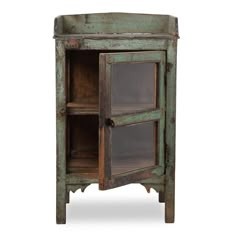 an old wooden cabinet with glass doors on one side and two shelves on the other