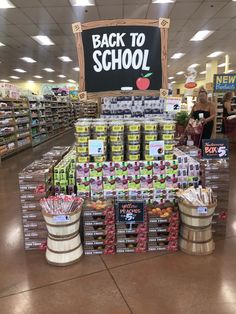 the back to school sign is on display in a grocery store