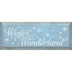 a wooden sign that says winter wonderland with snowflakes and stars in the sky