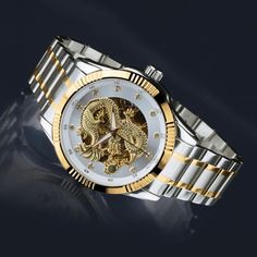 Daniel Steiger Dragon Automatic White Watch Gold Automatic Chronograph Watch As Gift, Gold Automatic Chronograph Watch For Gift, Gold Diamond Watch With Skeleton Dial As Gift, Dragon Emblem, Mens Watches Expensive, Symbol Of Power, Peridot Jewelry, White Watch, Mens Watches Black