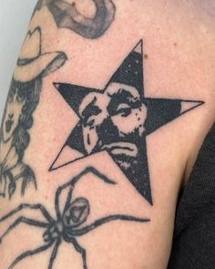 a person with a star tattoo on their arm