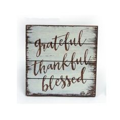 a wooden sign that says grateful, thank and besod on the side of it