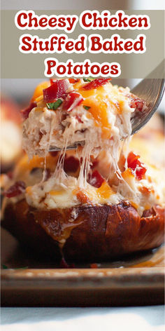 cheesy chicken stuffed baked potatoes on a plate with a fork in it and text overlay