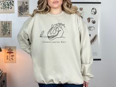 Get ready to be obsessed with your new  Dinosaur Sweatshirt   If Butterflies are your thing you will love this butterfly sweatshirt * Q U I C K * F A C T S * ✺ 100% preshrunk cotton ✺ Wash and dry normally  * S I Z I N G * ✺  ✺ Sizing is unisex so runs like men's, though not overly large ✺ Most women find their typical size works best since they are meant to fit a touch loose ✺ Size guide and fit: please see the size chart in the images. Before ordering  * S H I P P I N G * T I M E S * ✺ Our items are individually made with love for each of our buyers. Because of this, our processing time is 2-5 business days (depending on order volume) plus transit time, but typically much faster. We know our customers want their items as quickly as possible! * K E E P * S H O P P I N G *   ✺ Shop our ent Casual Dinosaur Print Crew Neck Sweatshirt, Dino Sweatshirt, Dinosaur Sweatshirt, Butterfly Sweatshirt, Aesthetic Crewneck, Quality T Shirts, Daughter Love, Uk Shop, To My Daughter