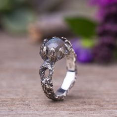 "Tree branch sculpted ring in sterling silver with labradorite gemstone. Witchy magical silver ring. This ring was sculpted in wax in the lost wax technique. Details & Measurement: * The ring width on the front side - 0.3\" (10 mm) * The ring width on the back side - 0.15\" (4 mm) * Gemstones in 8 mm to to set in the ring: Labradorite , rainbow moonstone, Smoky quarts in rose cut, Rutilated quartz with gold threads, Blue chalcedony in rose cut, Garnet * The ring arrives in a jewelry gift box Nature-inspired Moonstone Ring, Silver Labradorite Hand Forged Rings, Silver Labradorite Nature-inspired Jewelry, Hand Forged Silver Labradorite Rings, Nature-inspired Silver Labradorite Jewelry, Nature-inspired Silver Rings With Natural Inclusions, Nature-inspired Round Labradorite Jewelry, Fantasy Rings, Magical Ring