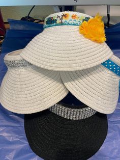 SALE: Straw like sun visors hand decorated with rhinestone trim or grosgrain ribbon and flowers. Comfortable band approx 3.5" brim. White Summer Visor Hat, White Visor Hat For Spring, White Spring Visor Hat, White Spring Visor, One Size Fits Most, White Visor For Beach Spring Season, White Visor For Spring, One Size Fits Most, White Visor For Spring Vacation, White Visor One Size Fits Most For Spring, White One-size Spring Visor