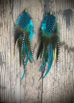 Long Feather Earrings Extremely Lightweight Perfect as a Pair or Wear as a Single Earring-- Even Better, Give one to a Friend to Wear as BFF Earrings! DETAILS: Feathers, With Some Cruelty Free Feathers Sold w/ Hypoallergenic Gold + Silver Interchangeable Hooks Blue, Turquoise, Brown, Black, Natural 9" Longest Length --FREE SHIPPING-- Bff Earrings, Free Earrings, Earrings Blue, Feather Earrings, Single Earring, Blue Turquoise, Cruelty Free, Feathers, Jewelry Earrings Dangle