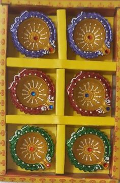 four small decorative items in a box