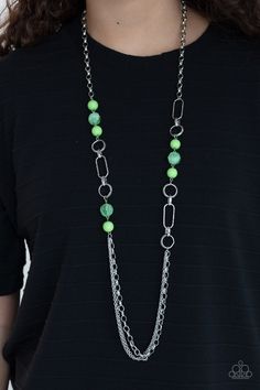 Apple green opaque round beads and transparent faceted beads playfully accent textured round and  oval hoops midway down a large silver chain. A triple set of large and small linked chains creates a delightful  finish. Features an adjustable clasp closure. Cheap Beaded Necklace With Round Beads, Luxury Round Beaded Chain Jewelry, Cheap Green Crystal Necklace With Faceted Beads, Cheap Green Beaded Chain Crystal Necklace, Trendy Green Jewelry With Faceted Beads, Green Oval Beaded Chain Jewelry, Green Necklaces With Round Beads Chain, Green Necklaces With Oval Beaded Chain, Neon Grunge